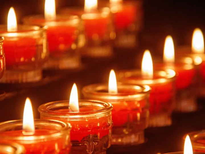 Warm and calming image of red votive candles