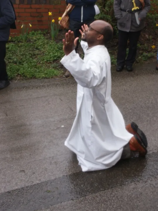 Long Walk to the Cross Kip Praying