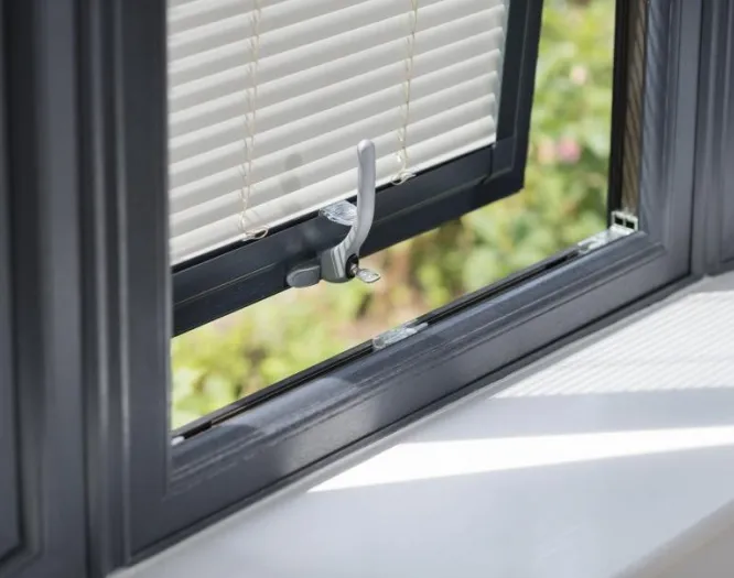 Tilt and turn window in dark grey