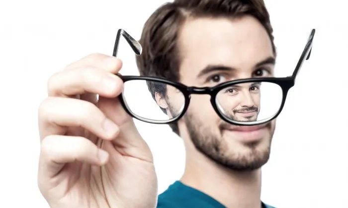 Man with glasses on white background