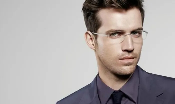 Man wearing rimless glasses