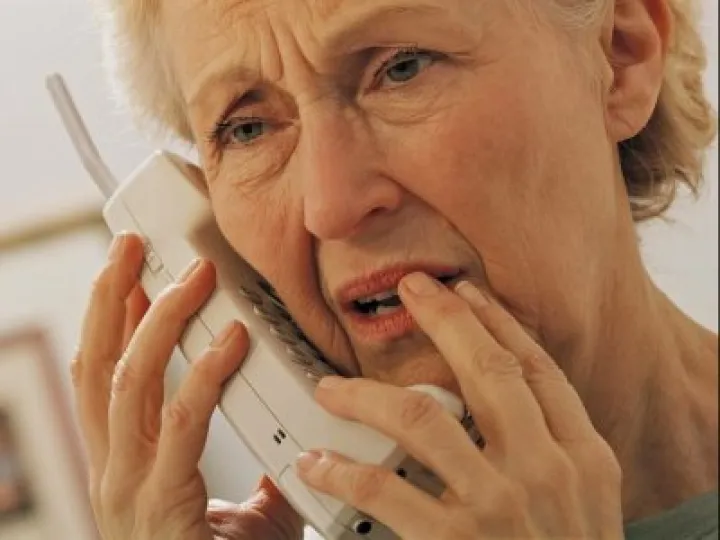 Worried Senior Person on Phone