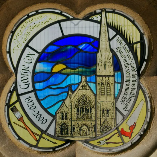 George Cox window with church