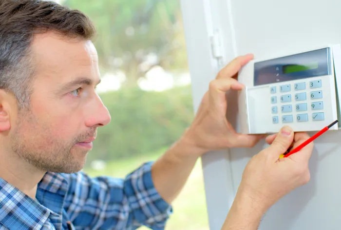 Engineer assembles control panel