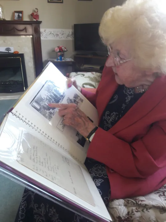 1 LEAFING THROUGH AN ALBUM DORISS PARENTS LEFT HER DEPICTING THE CHAPELS SEMINAL MOMENTS