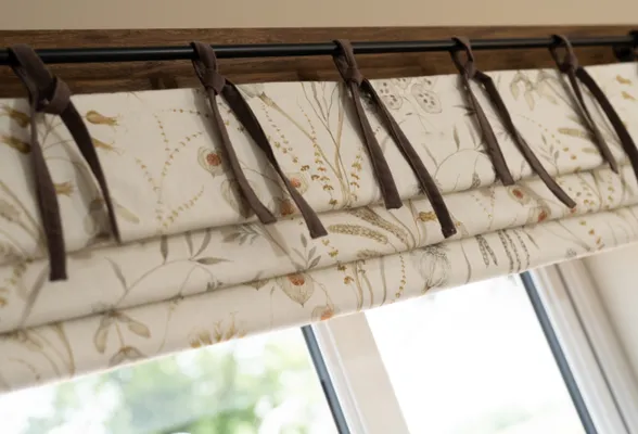 Roman blinds with ribbons
