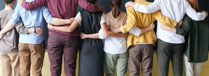 Group of People Standing Indoors