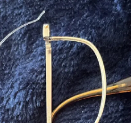 Broken metal eyewear frame