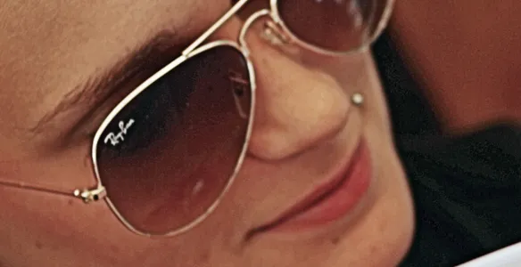 Woman wearing Ray-Ban sunglasses