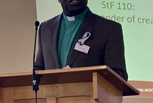 Revd Paul Nzacahayo leads opening devotions