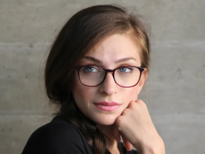Woman wearing red spectacles