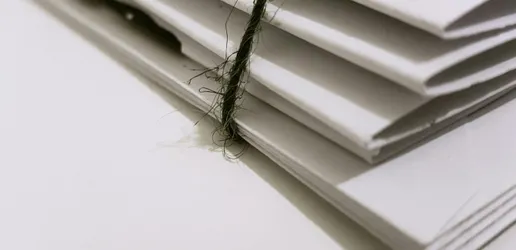 White Paper Folders With Black Tie
