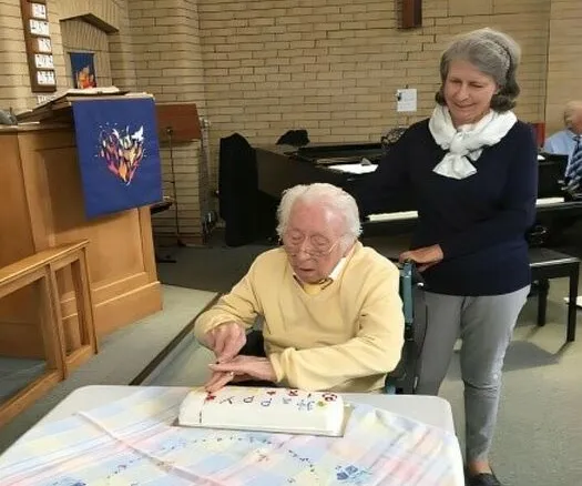 Frank cutting Anniversary cake 24