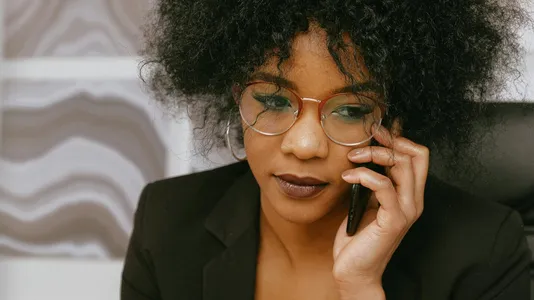 African American businesswoman in office, focused