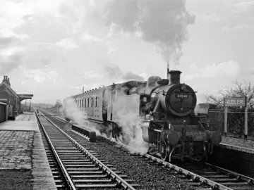 Ivatt 2 2-6-2T 41241 (a former Bath Green Park Loco) leaves Audlem with the 10.08 Wellington &ndash; Crewe service, 30/12/60. www.railphotoprints.co.uk &ndash; Hugh Ballantyne
