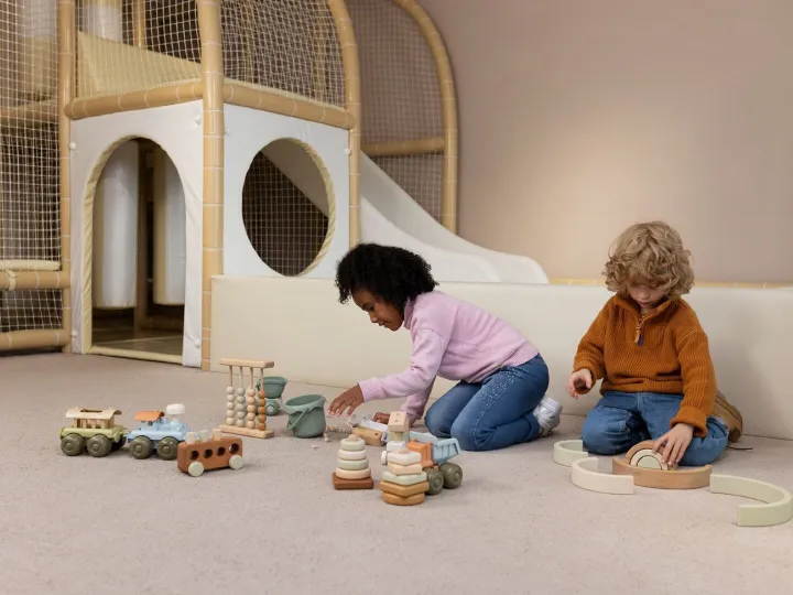 Full shot kids playing with eco toys