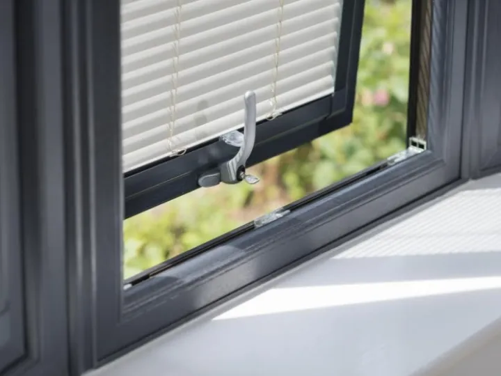 Tilt and turn window in dark grey