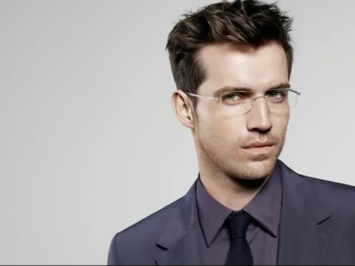 Man wearing rimless glasses