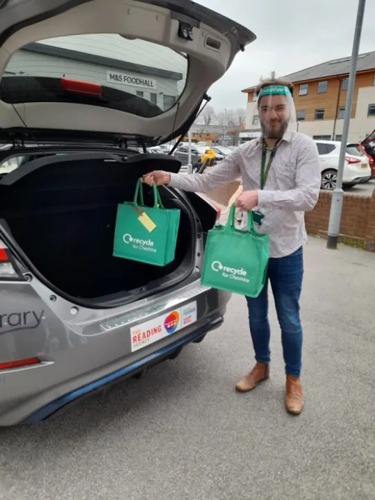 Liam At Back Of Electric Vehicle