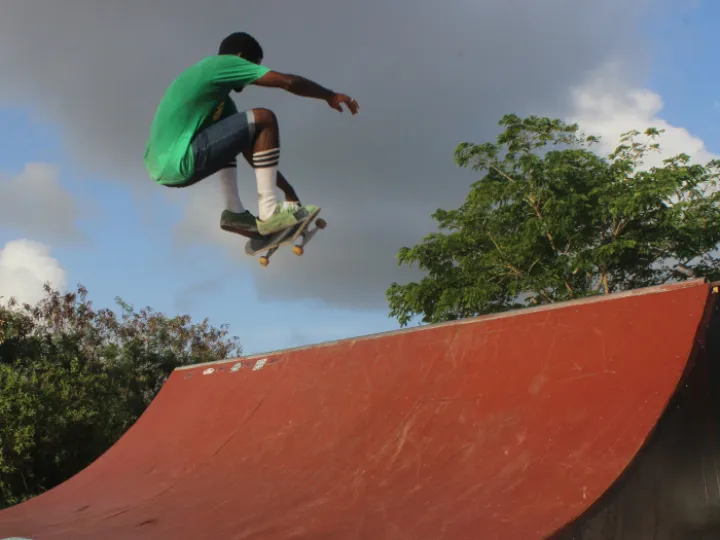 Skateboarder on red vert