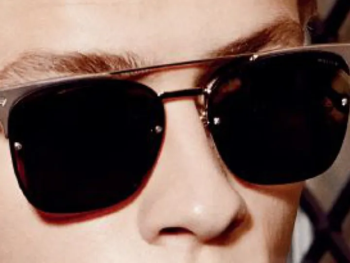 Woman wearing Police sunglasses