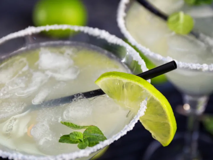 Cocktail glass with lemon wedge