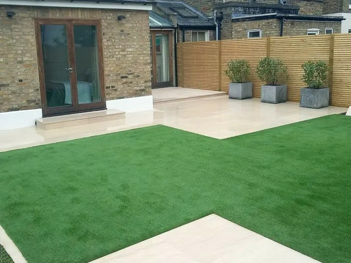 Artificial grass installation in garden