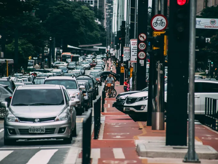 Urban street scene with heavy traffic and