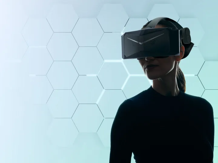 Young woman wearing a Pimax VR headset