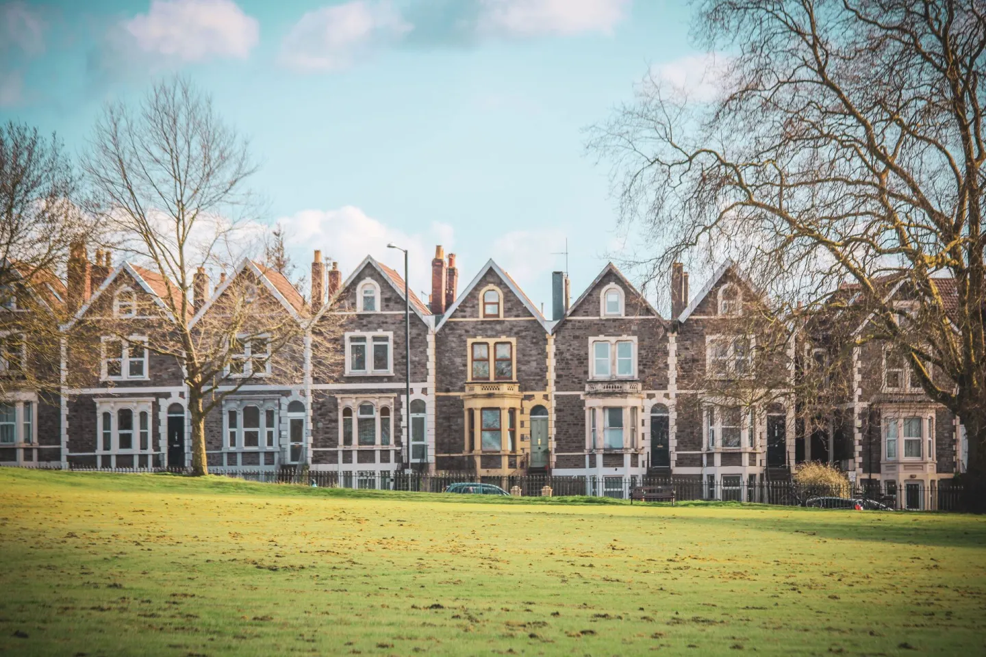 Victorian terraced houses overlooking a green