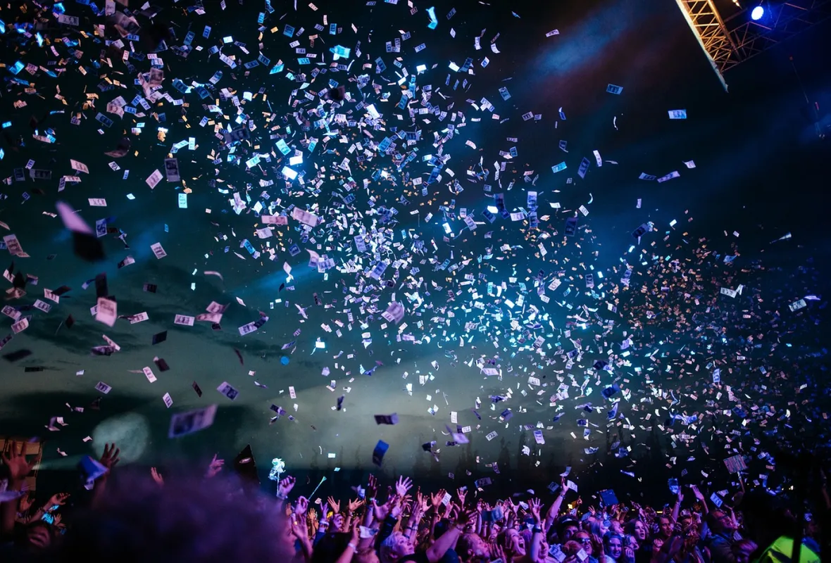 Confetti cascading down during a rock concert