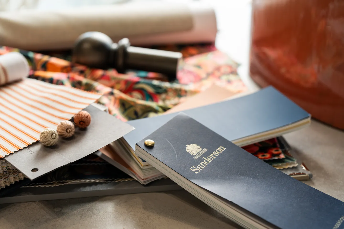 Pattern books and fabrics on a table
