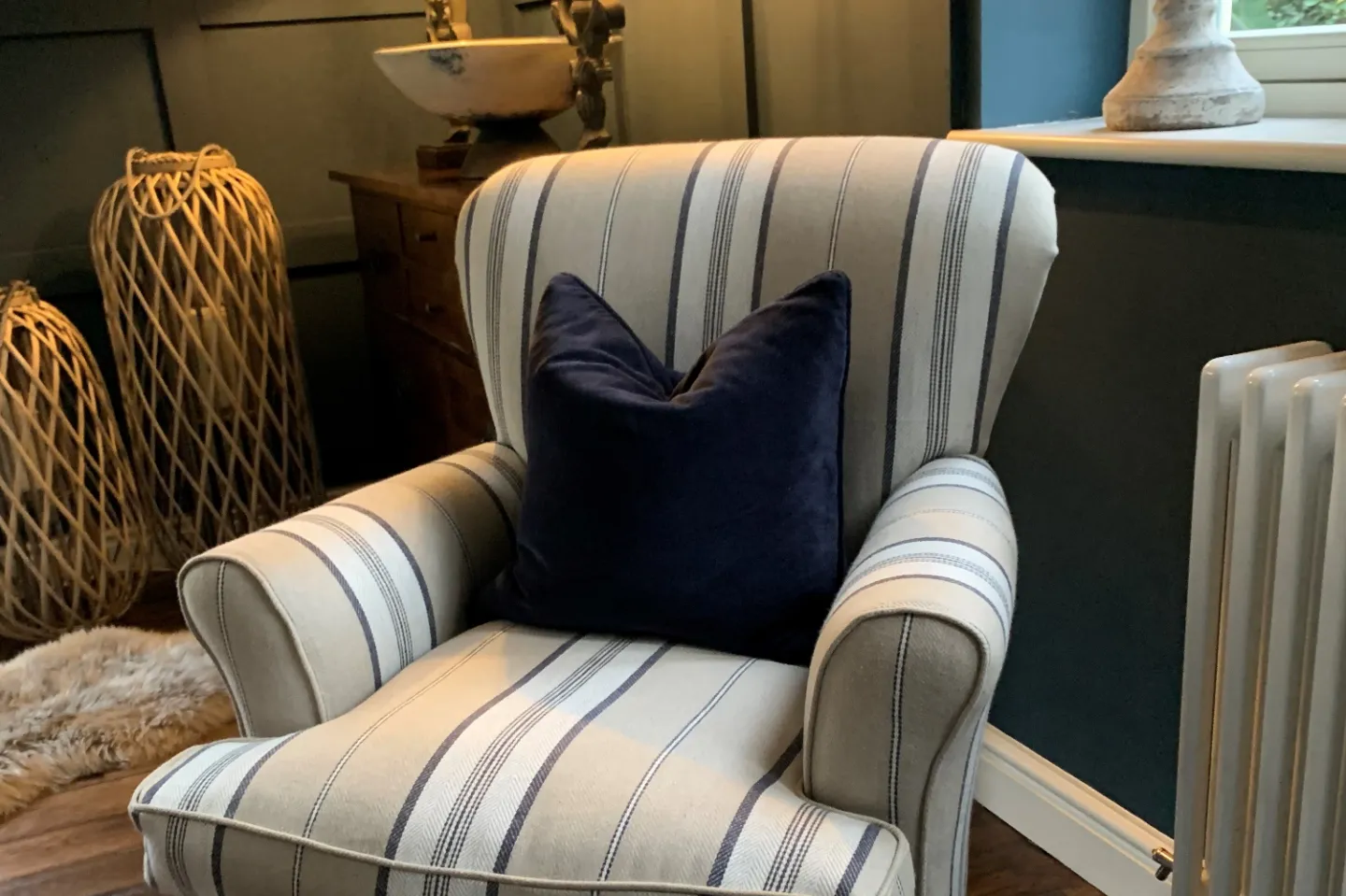 Striped chair with dark cushion
