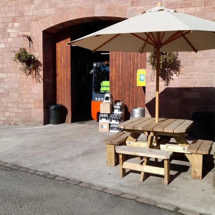 Wincle Brewery with picnic tables outside in the sunshine
