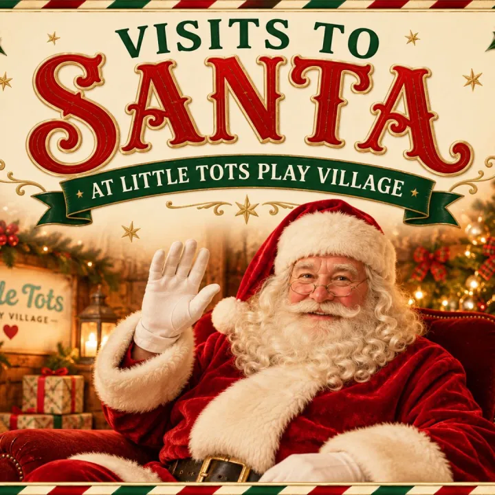 Santa Claus waving from a cosy Christmas grotto at Little Tots Play Village, with festive decorations and a Christmas tree in the background.