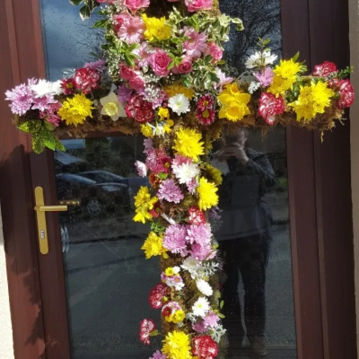 Easter '16 cross with flowers outside church