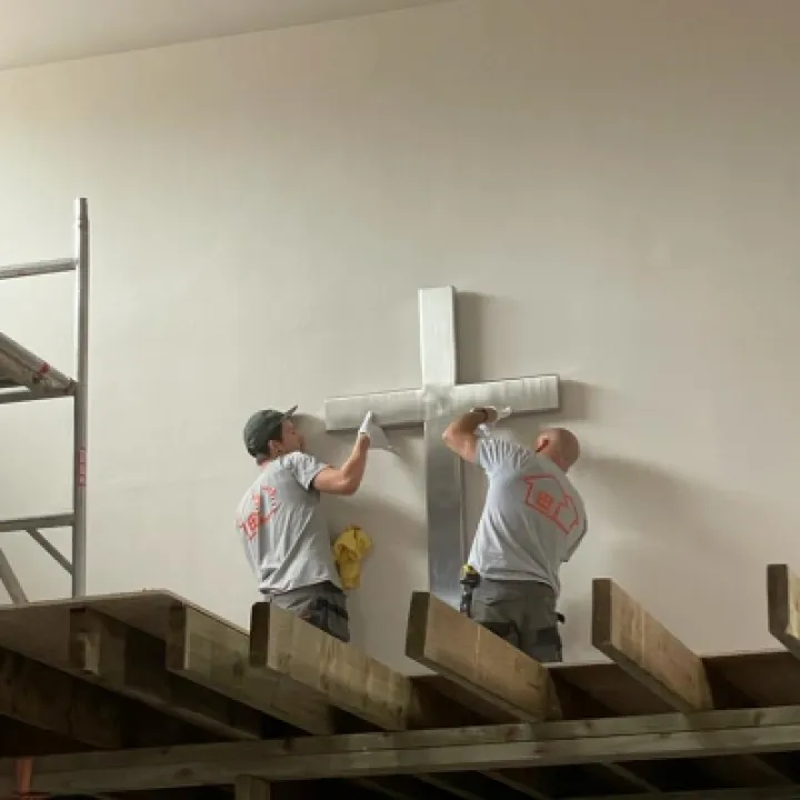 The cross reinstated