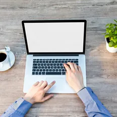 Person's Hand on Laptop