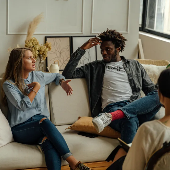 A Woman Talking at a Couple's Therapy Session