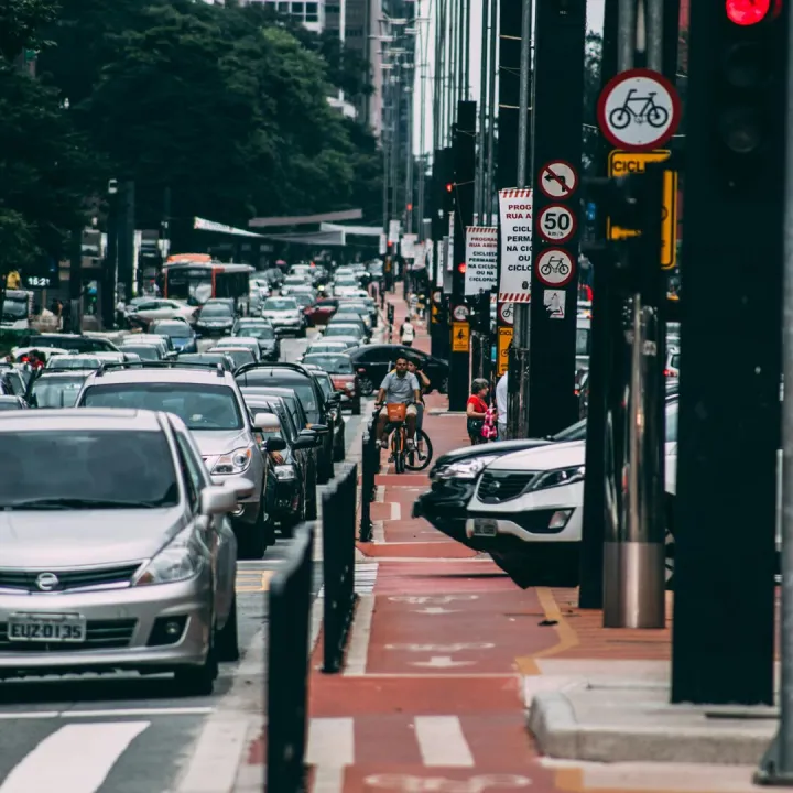 Urban street scene with heavy traffic and
