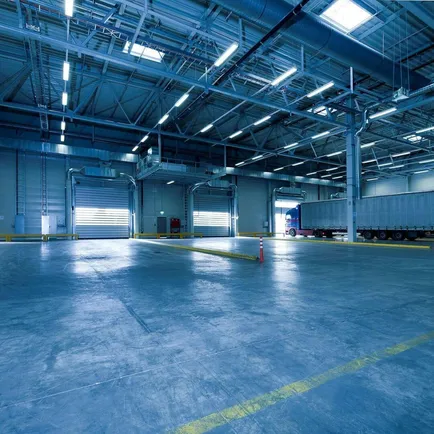 Wide view of an empty modern warehouse with