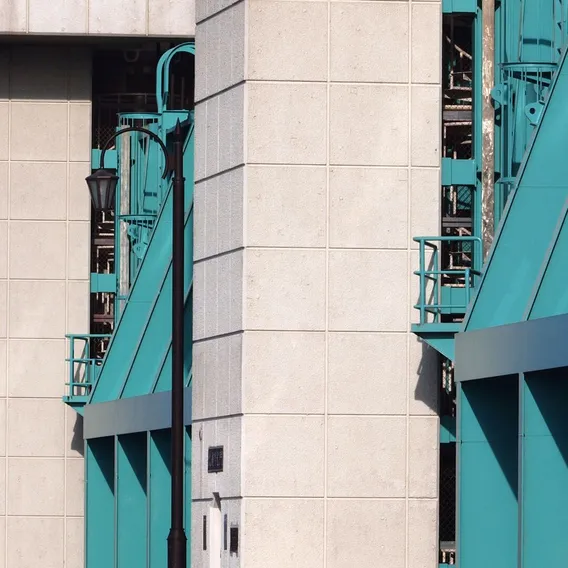 Steel painted blue green on factory exterior