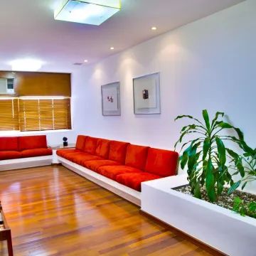 Doctor's waiting room with red chairs