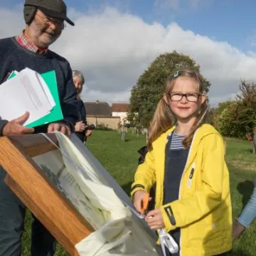 Sophie cuts the ribbon