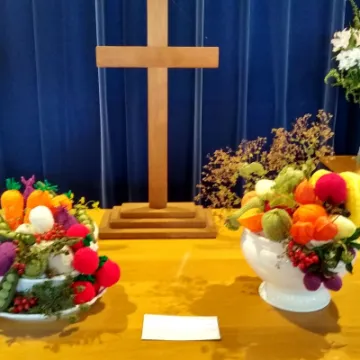 Knitted fruit and cross