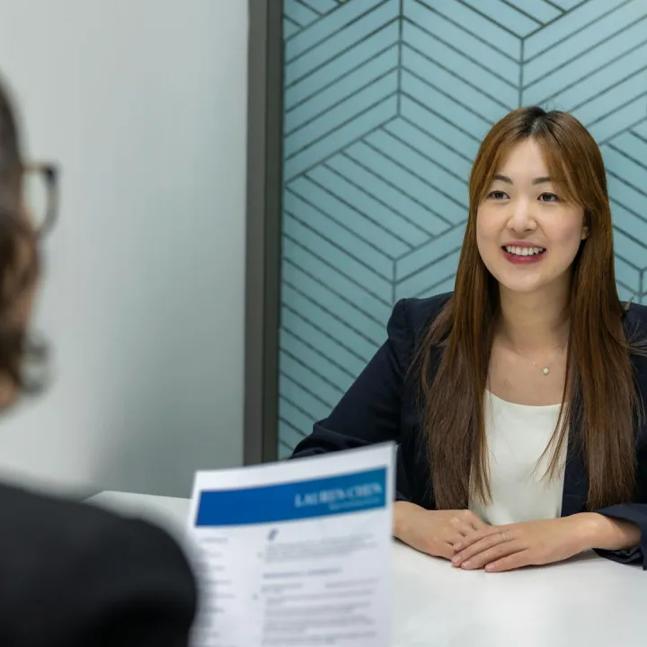 Young woman in a business meeting with an