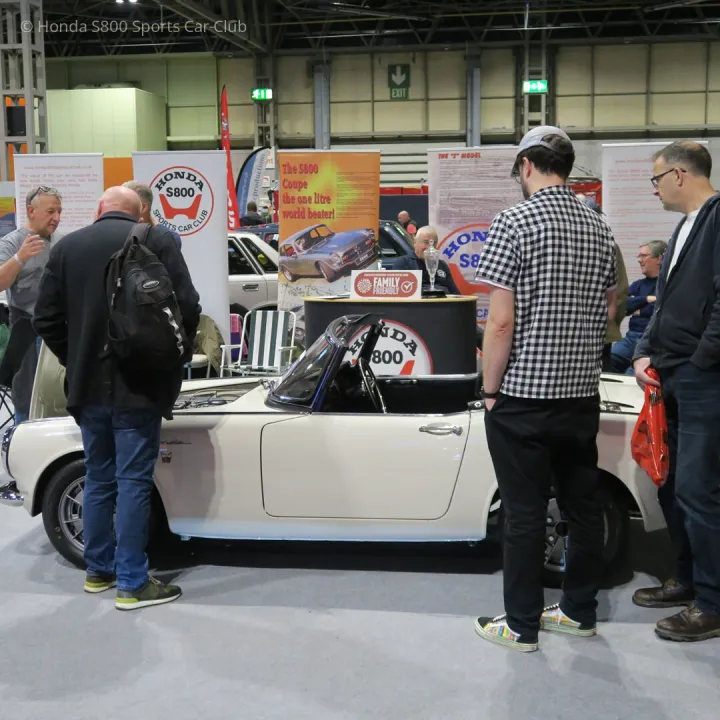 Admiring newly restored S800 convertible