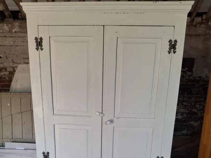 Items for sale
– Wooden wardrobe. Painted. Hanging space with shelf above. 20