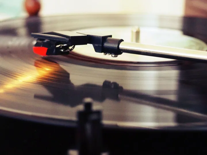 Detailed view of a spinning vinyl record on a