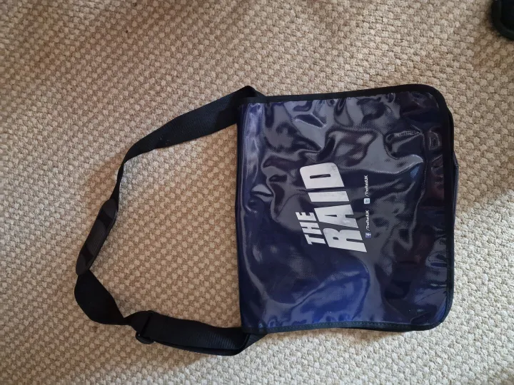 Items for sale
– Large pvc 'THE RAID' shoulder bag with canvas strap. £3
